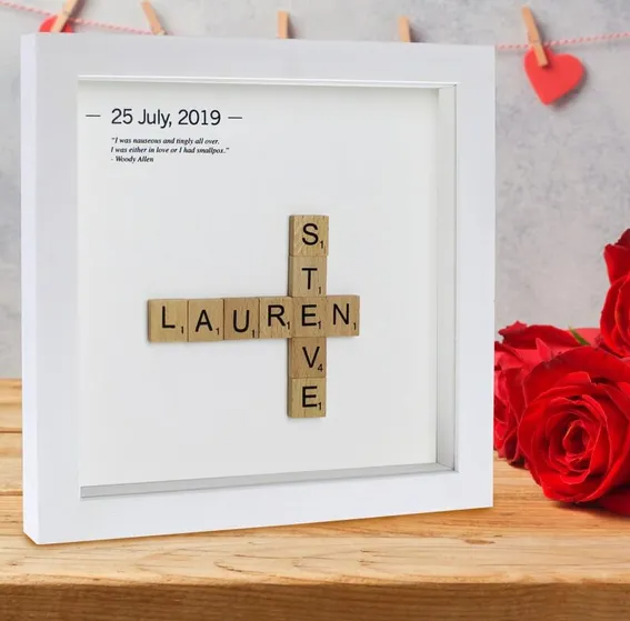 Scrabble tiles with names intersecting as well as a date and personalised quotation. Fantastic valentine's day gift.