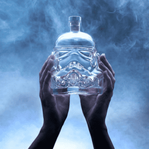 picture of two hands holding up a stormtrooper decanter, surrounded by smoke. 