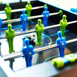 picture of a blue and green table football set foosball set that is portable 